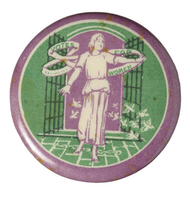 Purple, white and green circular tin badge: 1908-1914